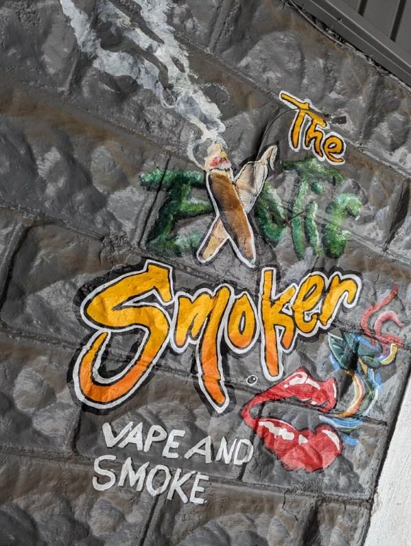 The Exotic Smoker Vape and Smoke Shop - Augusta - Georgia - Logo on Brick Wall